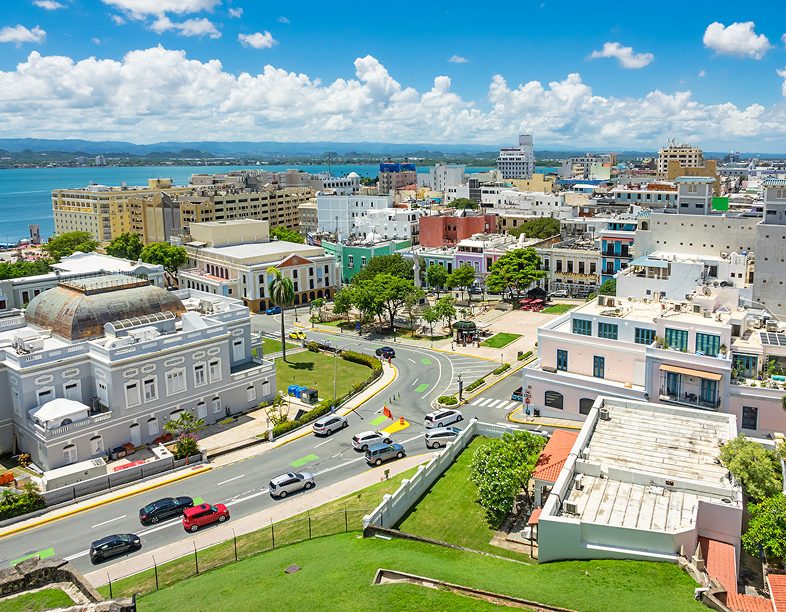 Aerial view of cityscape and coastline.