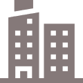 Icon of two gray buildings on black background.